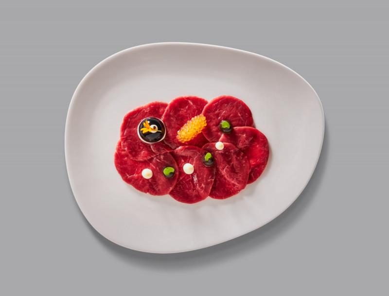 Assiette plate ivoire porcelaine vitrifiée 26,8x21,5 cm Shaped Rak